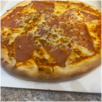 Tomaten, kaas, ham en oregano